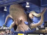 An Alien Octopus bursts through the walls of Fry's Electronics!